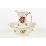 An NHP toilet jug and basin set, printed with floral sprays. Bowl diameter 41 cm.