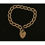 A 9 ct gold bracelet with padlock, 18.9 grams.