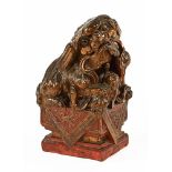 A Chinese carved and giltwood Dog of Fo. Height 30 cm.