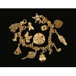 An Italian Aurafin 14 ct gold charm bracelet, 18.7 grams (see illustration).