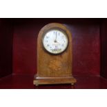 Inlaid wooden mantle clock