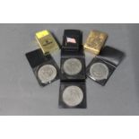 Two Jubilee commemorative coins, two Charles and Diana commemorative coins,