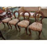 Four Victorian balloon back chairs with tapestry seats.