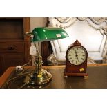 Desk lamp with green glass shade and Churchill quartz Westminster chime mantle clock