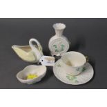 Belleek cup and saucer, swan ornament,