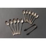 Silver teaspoons and sugar nips