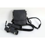 A pair of Opticron 10 x 42 binoculars with case.