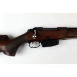 A Tikka M595 bolt action rifle,