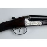 J Graham & Co a 12 bore side by side shotgun, with 28" barrels, cylinder and half choke,