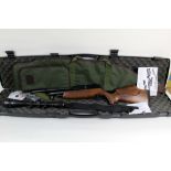 A BSA Ultra multi shot cal 177 pre charged air rifle, fitted with a beech stock, sound moderator,