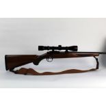 A Ruger 77/22 cal 22 LR bolt action rifle, fitted with a Simmons 3-9 x 40 telescopic sight,