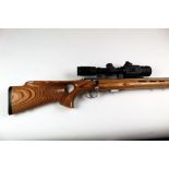 A Savage Model 93R17 cal 17HMR bolt action rifle, fitted with a laminate thumb hole stock,