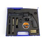 A Smith & Wesson Model 586 cal 177 CO2 revolver, with case, four magazines, pellets etc. Serial No.
