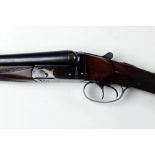 A BSA 12 bore side by side shotgun, with 30" barrels, cylinder and half choke, 2 1/2" chambers,