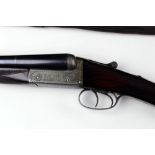 A 12 bore side by side shotgun, with 28" sleeved barrels, cylinder and improved choke, boxlock,