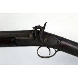 An unusual left-handed percussion single barrelled sporting gun,