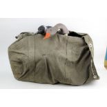 +/- Fifteen goose shell decoys, with bag.