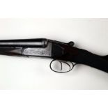 George Bate a 12 bore side by side shotgun, with 28" sleeved barrels, Damascus on steel and blued,