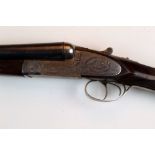 A Silver Sable Deluxe 12 bore side by side shotgun, with 27" barrels, improved and half choke,