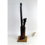 A shotgun lamp, overall height including bulb fitment 71 cm.