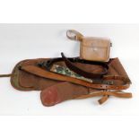 A Brady canvas and leatherette rifle slip, a leather pouch and three rifle slings.