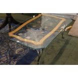 Modern metal wicker base glass topped table, height 43 cm, width 70 cm,