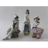 Three Nao figurines