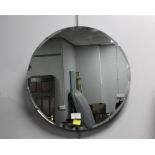 Circular bevelled edge frameless mirror,