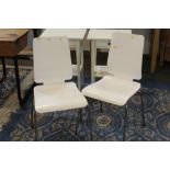 Pair of white modern kitchen chairs