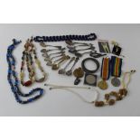 Collection of costume jewellery, 1914-18 Service Medal, cap badge,