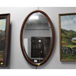 Bevelled edge oval mirror,