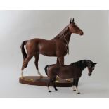 Two Beswick horses "Minstrel" mounted on wooden base.