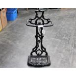 Ornate cast metal stick stand