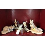 Collection of wildlife figurines, fox, bird, dogs,