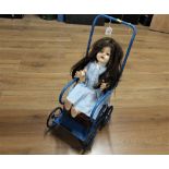 Vintage dolls pushchair and doll
