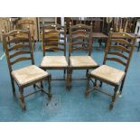 Four oak ladderback chairs with rush seats