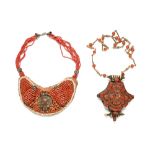 A vintage Tibetan coral mounted Gua box and a similar neckpiece. (see illustration).