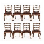 A set of eight mahogany ladder back dining chairs,