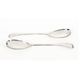 A pair of Edwardian silver serving spoons Sheffield 1912, both 23 cm long, weight +/- 158 grams.