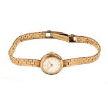 A ladies Marvin 9 ct gold cased wristwatch, with 9 ct gold strap. Gross weight 18 grams.
