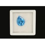 A loose blue topaz, teardrop shaped, 13.1 carats.