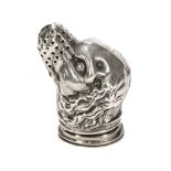 A silver salt pot in the form of a novelty dog head, Birmingham 1905, 3.5 cm high.