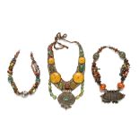 Three vintage Tibetan multi stone necklaces. (see illustration).