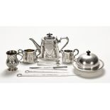 A 19th century silver plated tea service, christening mug, muffin dish, tongs,