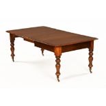 A Victorian mahogany dining table,