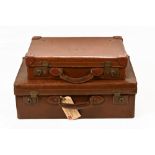 Two vintage leather suitcases. Largest width 60 cm.
