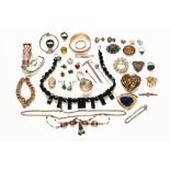 A miscellaneous collection of costume jewellery, in red leatherette case.