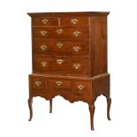 A George III oak chest on stand,