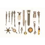 A collection of silver and plated bijouterie, to include sugar tongs, clock keys,