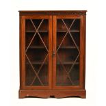 An Edwardian mahogany bookcase,